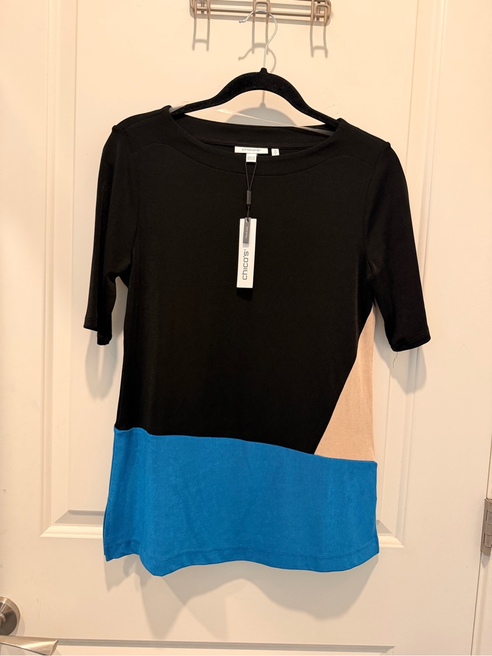 Chico's Travelers Asym
Colorblock Tunic Size 0 SS
Top Scandi Blue